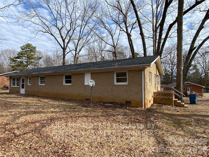 Just updated throughout! You'll love this brick duplex with a quaint rural setting!