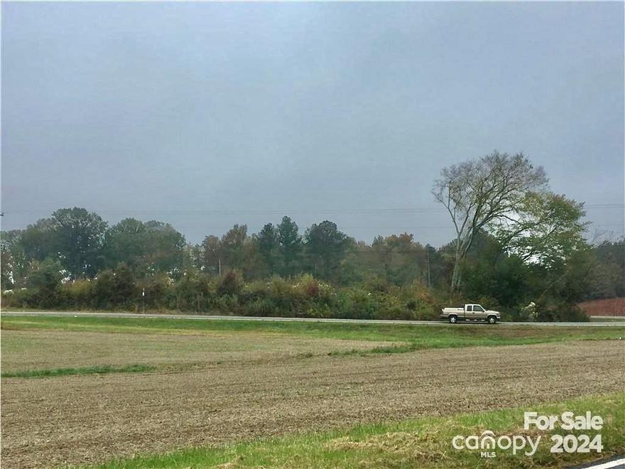 This 4.79 acre deeded parcel has road frontage on NC 138 and Old School Road.  This can be a great lot for a home site. It is good farm land and will make great pasture land for horses. The seller Will provide a survey and has already obtained a portion of the soil science study needed for a required engineered septic system.