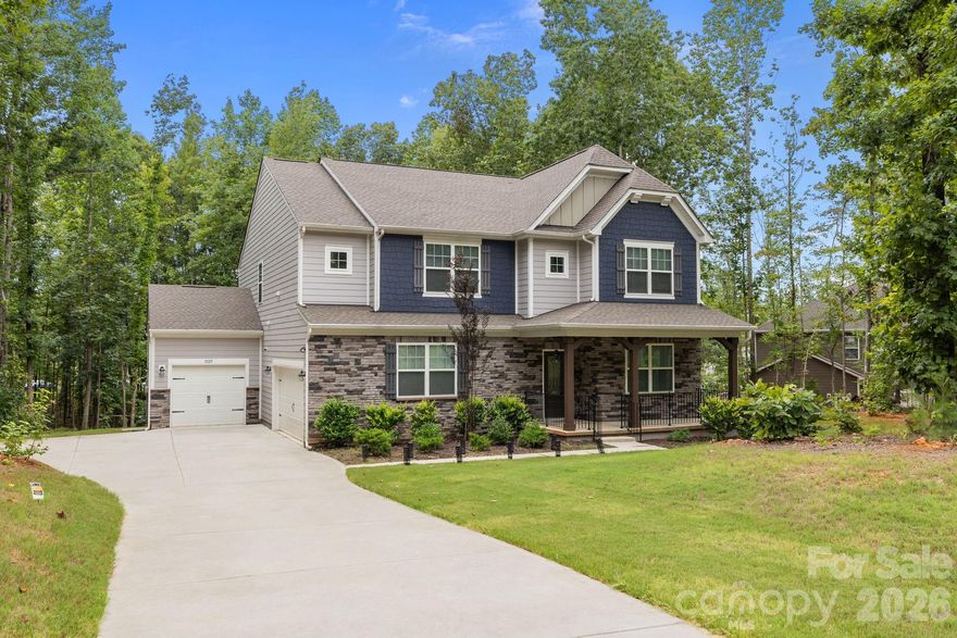 SELLER OFFERING $5,000 CREDIT & 2 YEARS of HOA dues PAID with acceptable offer!!Welcome to 11125 Dappled Light Trail, Mint Hill, NC — a spacious 5-bedroom, 5-bathroom home on .78 of an acre offering versatility, comfort, and modern updates. The primary suite is upstairs, while the main level features a secondary primary/guest suite with full bath, ideal for multi-generational living or hosting visitors. All secondary bedrooms connect to a full bath, providing privacy and convenience for the entire household. Inside, enjoy updated lighting, a refreshed powder room, and a finished garage for added functionality and style. Outside, the backyard has been recently cleared, with trees removed to create a wide-open space that was just graded and sodded to make an amazing yard and outdoor space! This generous lot is a blank canvas—ready to be transformed into your own outdoor retreat with room for gardens, play areas, and privacy! With its thoughtful layout, stylish updates, and expansive outdoor potential, this Mint Hill gem is ready to welcome its next owner.