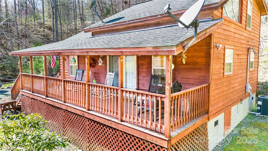 Welcome to the charming "Tuck Away Cabin," an amazing cedar-sided retreat in a wooded setting with a mountain view. As you step onto the spacious, covered front porch. This cabin features 2 bedrooms, 2 baths, and a loft area, providing ample space for up to 12 guests. The cabin comes fully furnished, complete with delightful bear-themed decor. A well-equipped eat-in kitchen with instant hot water and white appliances adds to the charm. It's ready for you to move in or use as a vacation rental. A new HVAC system was installed in 2023. Entertainment options include TV and Internet service provided by Hughes Net, with Wi-Fi for the thermostat serviced by AT&T. This home is in a friendly neighborhood, conveniently close to grocery stores, restaurants, churches, & gas stations. 20 minutes to Franklin, 40 minutes to West Asheville, 20 minutes to Waynesville, and an hour to Pigeon Forge. 15 min. to Harrah's Casino. For outdoor enthusiasts, there are numerous lakes and fishing streams nearby.  The 2 bedrooms have queen sized beds, the loft has 4 beds.