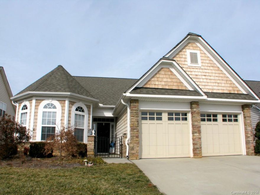 This home shows like a model. Both formal and informal areas. Indoor and outdoor areas conducive for entertaining or relaxing. Covered rear porch and large patio. Many upgrades including European style island in kitchen, stone wall in rear. 3 full baths-a nice plus!