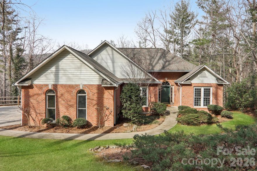This lovely 5-bedroom home is thoughtfully priced below a 2025 appraisal, offering strong value for buyers.  The main level features a split-bedroom plan with a primary suite showcasing tray ceilings and an en-suite bath with soaking tub, separate shower & walk-in closet.  Low-maintenance bamboo floors run throughout the main living areas.  The updated kitchen offers newer stainless appliances and a pantry with washer/dryer hookup that can easily be converted back to a dedicated laundry space. Gas fireplace in living room provides cozy ambience and extra heat.  Two guest bedrooms and a full bath complete the main level.  The large deck with some mountain views is ideal for outdoor entertaining or relaxation. The attached garage includes a 50-amp EV charger.

The mostly finished walk-out basement offers flexibility as a second living area, guest quarters, or recreation space, and offers natural light throughout much of the space.  It includes two additional bedrooms, a full bath, flex room & laundry room with storage.  The spacious kitchenette simply needs a cooktop to function as a full kitchen, offering excellent potential for extended living arrangements or multi-generational use.  The downstairs family room features surround sound that conveys, along with a large safe located in the storage area that also conveys.

The basement patio opens to a fenced backyard suitable for pets, play, or gardening.  The property is conveniently located to shopping, schools & healthcare. Offering space, flexibility, and everyday convenience, this home is ready to welcome its next owners.