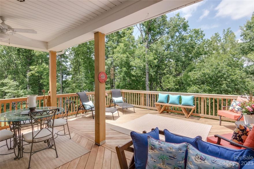 Feel like you're on vacation every day in this perfectly situated basement home with serene lake views and covered porches providing awe-inspiring vistas to relax and enjoy nature & wildlife. Follow the backyard path to the lake, where you can pull your kayak, canoe or paddle board in. The basement is an exciting feature with a large recreation room, a bedroom with walk-in closet, a full bathroom and a large unfinished storage or gym area. The main floor boasts a light and bright open concept living space with a huge kitchen island, great for entertaining. In addition, the Primary Bedroom Suite is tucked away on the Main Floor with the laundry room conveniently located nearby. Upstairs features two spacious bedrooms and a full bathroom. This kind of lot, with its stunning water views, does not come available often. And there is plenty to do in this amenity-rich neighborhood including a full & fun social calendar. Don't miss the opportunity to enjoy the lake life at its best.