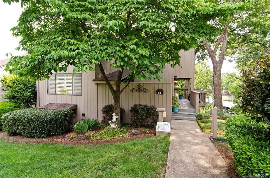 Waterviews from almost every room! 4 decks and patios to enjoy the views. End unit with amazing owner suite, loft, & sunroom. Additional 100 sq ft finished closet. Built ins in great room, updated and remodeled kitchen and baths, mother in law/teen suite downstairs with separate entrance. Rennai instant hot water heater, lots of storage, gated lake front community, Clover School District. This 1 has it all!!