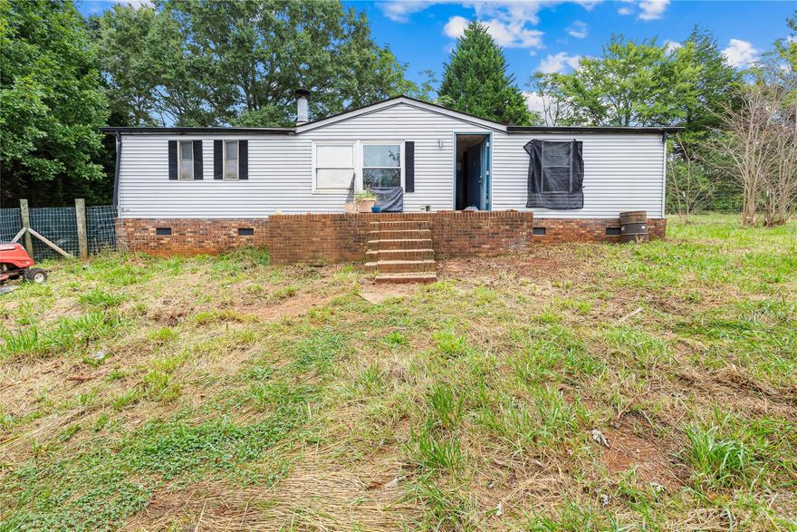 Calling all investors and builders, this property has great potential, 1038 Goldmine Dr at .46 of an acre and 1022 Goldmine Dr  at .51 of an acre, Total acreage combined is .97 of an acre.  The 2 parcels being sold 3780048299440000 and 3780048381700000, You can remodel or build. Home being sold "AS Is"