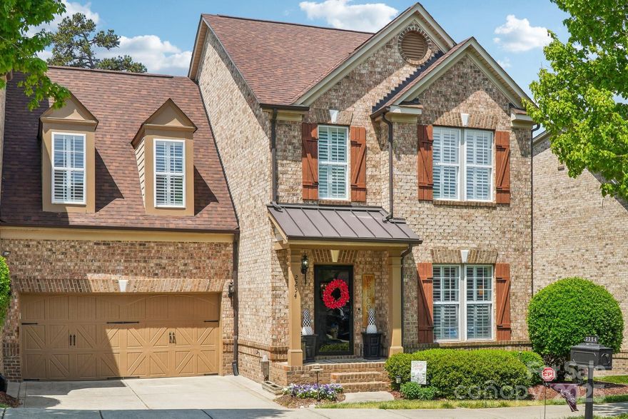 Invest in your lifestyle! Main Level hardwood floors, elegant crown molding & stylish plantation shutters throughout. Modern kitchen, painted cabinets, sleek quartz ctops and backsplash, large center island with breakfast bar. Enjoy the SS  LG gas range with a double oven, built-in microwave, Samsung refrigerator, wine cooler, single-bowl sink, recessed lighting & undercabinet lighting. Stay organized with built-in desk/planning station, open shelving & storage! Dining room w/chair rail great for entertaining & great room w/gas fireplace & built-in cabinets. Large primary bedroom retreat w/oversized custom tile shower w/dual shower heads. All Bedrooms closets have built in shelving. Finished Basement w/full kitchen, comfortable bedroom, full bathroom, spacious living room & dining area. Perfect as an in-law suite or a private haven for a college student! Concrete patio offers hot tub for relaxation, Large trex deck w/iron pickets & gas grill hookup over looks mature trees.