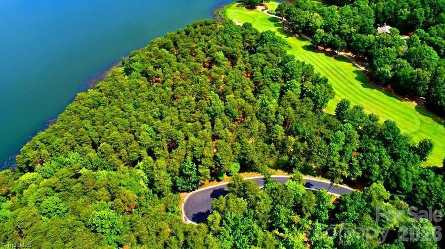 Stunning lake front home site located in the Southpoint neighborhood of the beautiful lake and golf community, Old North State Club. Breath taking views of Badin Lake will be enjoyed from a custom built home of your dreams. The lot qualifies to have its own single private pier when the home is under construction. Take advantage of this unique opportunity to own property in one of North Carolina's top-rated private golf communities.