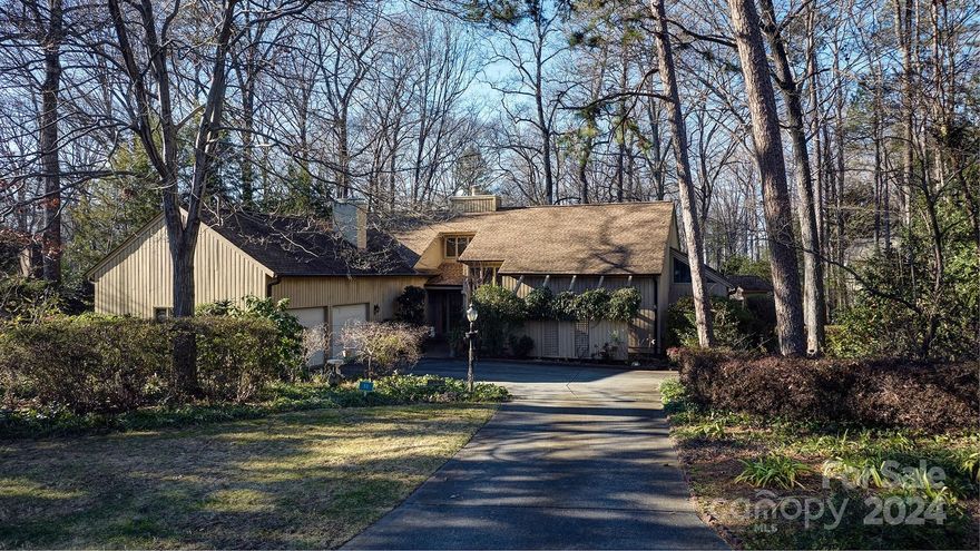 Living large in River Hills!Master bedroom on main floor and additional bedroom with ensuite bath,cathedral ceilings in great room with catwalk across upstairs for dramatic flair,formal dining room,kitchen w/ eat in ,cozy den with additional fireplace to enjoy those crisp morning AND massive sunroom with floor to ceiling windows to bring all the light in.Oversized decking across the complete back of the house with plumbed gas grill and a changing room for adding a hot tub!Upstairs offers 2 more big bedrooms each with its own bathroom and 500 square feet of walk in storage rooms! Of course home offers wet bar on the main floor for entertaining.Bring your ideas for updating.Home is situated on nice level lot on of of the most desirable streets in River Hills.Natural yard.Don't miss the miles of walking trails,marina,country club w 18 hole course & 2 pools,playgrounds and waterfront park with sandy beach!Also in the Clover school district. Come home to a lifestyle and 24 hour guard gate!