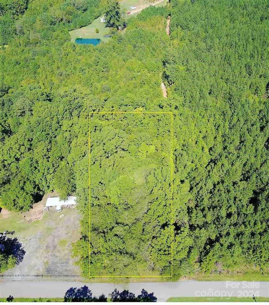 This 1.01-acre residential plot of land is ideal for constructing your dream home. It also provides the opportunity for a modular home, mobile home, or basement home, surrounded by plenty of trees for added privacy