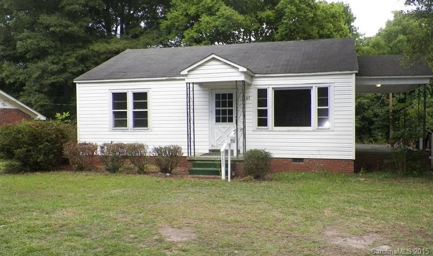 Make this cute house located in an established neighborhood your home with some updates.  It features two bedrooms, one bath, living room, kitchen, front and side covered porch, central heat and air.