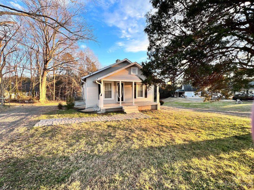 Look no further for your future home located just minutes from Downtown Kannapolis. Generous size kitchen and living room. Living room has a nice stone fireplace. Bathroom has a jetted tub and separate tiled shower. There is a semi circle drive way that wraps around the back of the home. Basement is clean and dry and has a garage door with automatic opener. Great space for a home gym, workshop, etc. It also has lights and has a vent for heating anc cooling but the ceiling is not finished.