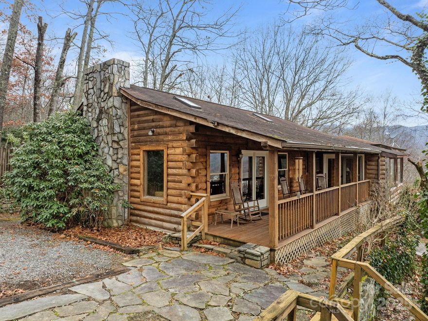 Enjoy breathtaking mountain views from this charming 3-bedroom house located within the town limits of Waynesville—just minutes from downtown shopping, award-winning restaurants, and local favorites. Featuring a BRAND NEW ROOF, this inviting home features a full basement with a separate entrance and a workshop space, perfect for hobbies, storage, or future expansion. The convenient proximity to amenities is hard to beat, with a short drive to the Blue Ridge Parkway and nearby recreation and activity centers. Combining scenic beauty with everyday convenience, this hidden gem offers the best of mountain living.