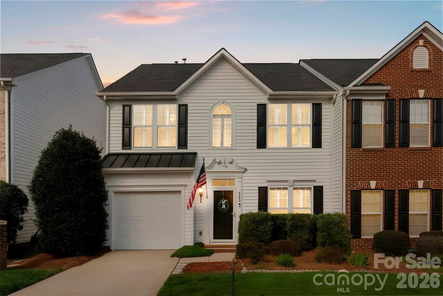 Welcome home to this charming and updated two-story townhome nestled in a highly sought after waterfront community on beautiful Lake Wylie! Step inside to find hardwood floors throughout the main level, plantation shutters, updated light fixtures, and a layout designed for both everyday living and entertaining. Enjoy an updated kitchen featuring beautiful granite countertops, multiple dining spaces, a cozy gas log fireplace in the living room, and an additional flex space which would make a great sitting area or office. Enjoy warm or cool nights on the screened porch overlooking the fenced backyard- perfect for morning coffee or unwinding in the evening. Upstairs, the spacious primary suite offers a peaceful retreat with elegant trey ceilings, his and hers walk-in closets, and a private ensuite bath complete with a separate shower and garden tub- perfect for relaxing at the end of the day. Two spacious additional bedrooms, a full bath, laundry room and all new carpet and tile complete the upstairs. Enjoy the lifestyle this Lake Wylie waterfront community offers, including a community pool overlooking the lake, scenic surroundings, and optional boat storage for those who love being on the water. The HOA covers exterior maintenance, yard care, streetlights, road maintenance, garbage and recycling service, and pool access, making this the perfect opportunity for easy, low-maintenance living in a beautiful lakefront setting! Come see it today!