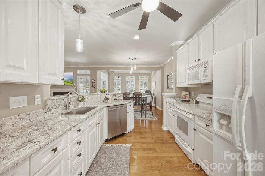 Welcome home to this charming and updated two-story townhome nestled in a highly sought after waterfront community on beautiful Lake Wylie! Step inside to find hardwood floors throughout the main level, updates galore including plantation shutters, updated light fixtures, and a layout designed for both everyday living and entertaining. Enjoy an updated kitchen featuring beautiful granite countertops, multiple dining spaces, a cozy gas log fireplace in the living room, and an additional flex space which would make a great sitting area or office. Enjoy warm or cool nights on the screened porch overlooking the fenced backyard- perfect for morning coffee or unwinding in the evening. Upstairs, the spacious primary suite offers a peaceful retreat with elegant trey ceilings, his and hers walk-in closets, and a private ensuite bath complete with a separate shower and garden tub- perfect for relaxing at the end of the day. Two spacious additional bedrooms, a full bath, laundry room and all new carpet and tile complete the upstairs. Enjoy the lifestyle this Lake Wylie waterfront community offers, including a community pool overlooking the lake, scenic surroundings, community beach area, and optional boat storage for those who love being on the water. The HOA covers exterior maintenance, yard care, streetlights, road maintenance, garbage and recycling service, and pool access, making this the perfect opportunity for easy, low-maintenance living in a beautiful lakefront setting! Come see it today! NEW GAS WATER HEATER MAY 2026!!