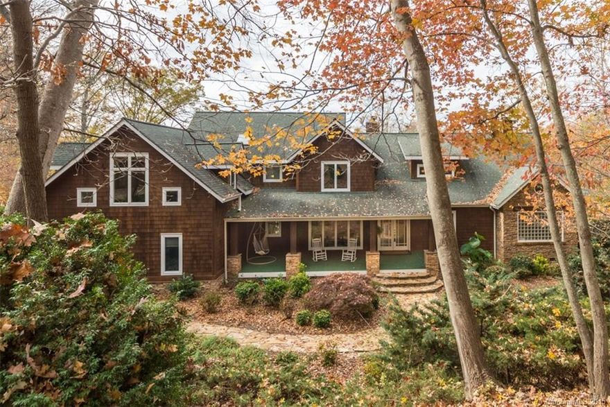 Gorgeous waterfront home with breath-taking views and deep water on quiet cove. Dream Kitchen has granite, high-end SS appliances, and large breakfast bar. Stunning main floor master with see-thru fireplace and luxurious master bath w/heated floors. Finished Basement has recreation room and 2nd Kitchen. 3 car garage. Lots of storage. In-ground pool has waterfall feature and hot tub. Easy commute to airport and Uptown Charlotte