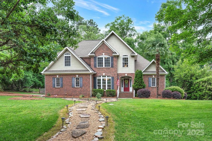 Welcome to this gorgeous 4-bedroom, 2.5-bath home nestled on a desirable corner lot in one of Lake Wylie’s most sought-after neighborhoods, Mariner’s Watch Cove, part of the Allison Creek community. This beautifully maintained home features an open floor plan that offers both style and functionality, with rich hardwood floors flowing seamlessly throughout the home. The spacious primary bedroom is conveniently located on the main floor, providing privacy and ease of access. The heart of the home—the kitchen—boasts granite countertops, a generous walk-in pantry, and an inviting keeping room and breakfast area perfect for casual gatherings or morning coffee.
Step outside onto the newly rebuilt deck overlooking a large, fenced-in backyard and in the winter months, enjoy picturesque lake views right from your home.
Located within the top-rated Clover School District, this property offers not only beauty and comfort but also a prime location just moments from the water.