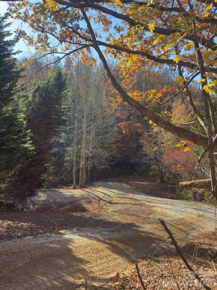 Rare, unrestricted land ready for your plans.  

Partially cleared with driveway access added, ideal for a tiny home, camper, mobile home, or mountain home.  Once cleared, partial mountain views possible from top of the property.  Only minutes from downtown Old Fort for dining and essentials.  Outdoor lovers have access to nearby hiking trails and Lake James is a short drive away.