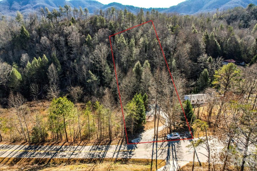 Rare, unrestricted land ready for your plans.  

Partially cleared with driveway access added, ideal for a tiny home, camper, mobile home, or mountain home.  Once cleared, partial mountain views possible from top of the property.  Only minutes from downtown Old Fort for dining and essentials.  Outdoor lovers have access to nearby hiking trails and Lake James is a short drive away.