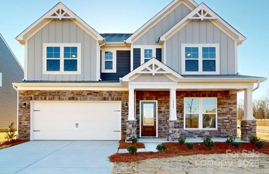 This beautiful 5 bed 4.5 bath home has it all! Walking in from your covered porch, you are greeted with an inviting foyer, complete with easily maintainable EVP flooring that continues throughout the main areas. Just off the foyer is a main level guest suite, complete with a full bath, allowing for maximum privacy. Walk into your open kitchen, family room & breakfast area. The kitchen is fit for a chef, with a walk in pantry, stainless steel appliances, including an overhead microwave exhaust & gas range, finished with an island! Upstairs you'll find a spacious loft, perfect for a secondary living space. You'll find 4 more bedrooms, 2 bathrooms, & a separate laundry room, finished with a sink & cabinets, before heading to the Owner's suite. This suite boasts tray ceiling, LED lights & a walk-in closet. The spa like bathroom is the star of the show, with dual vanity, separate tub & shower & private toilet area. All of our homes include a 10-Year Transferable Structural Warranty.