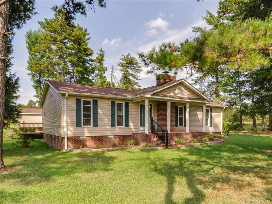 Amazing ranch on desirable corner lot.  Updated kitchen features granite, new cabinets, and stainless appliances.  Open floor plan with washer and dryer.  Large screened in porch and patio for entertaining.  Don't miss out!