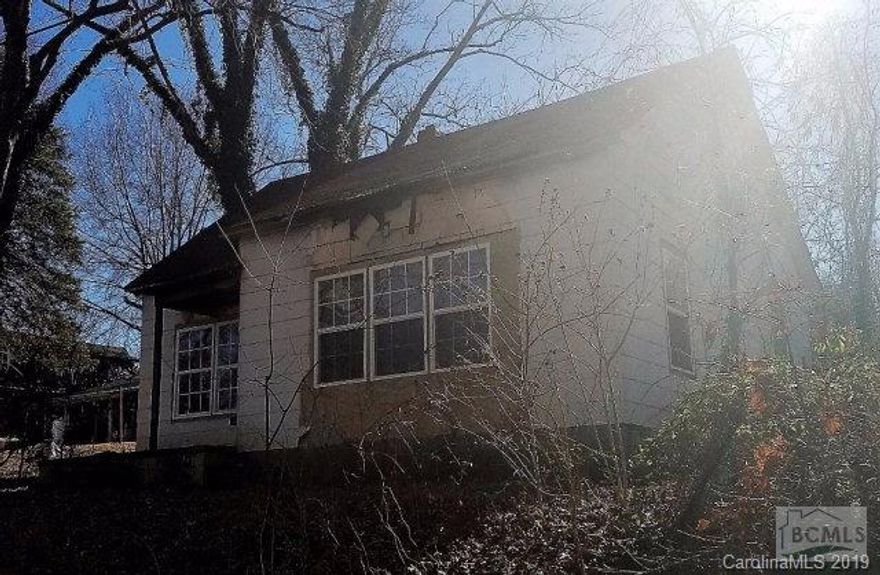 GREAT INVESTMENT OPPORTUNITY. Convenient in-town location. Interior has extensive fire damage. SOLD AS-IS. CASH OFFERS ONLY