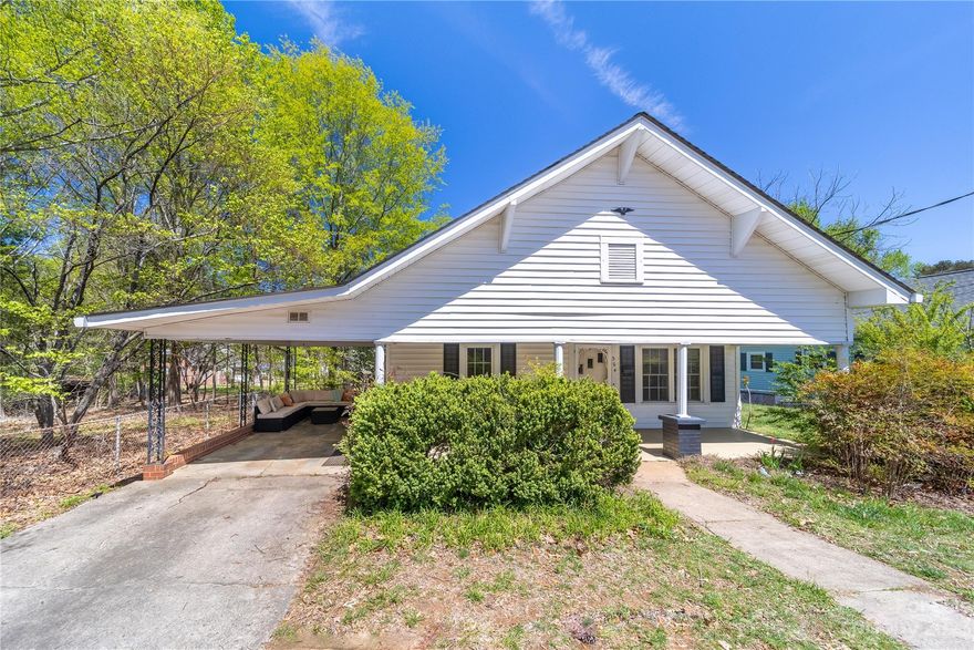 NEW LISTING! Cute bungalow style home in the desirable location of downtown Valdese. The home is located in close proximity to shops, dining, and recreational areas, with easy access to I-40. The home features a covered front porch and large fenced in back yard, ideal for pets. As you enter the home you will find tall ceilings and hardwoods in the living room that lead into the dining room, which is perfect for entertaining. The kitchen has plenty of storage and cabinet space. Off the kitchen you will find the bathroom, and a third room that can be used as a flex space or additional storage. The basement entrance is located in the back of the home's exterior. Schedule your showing today!