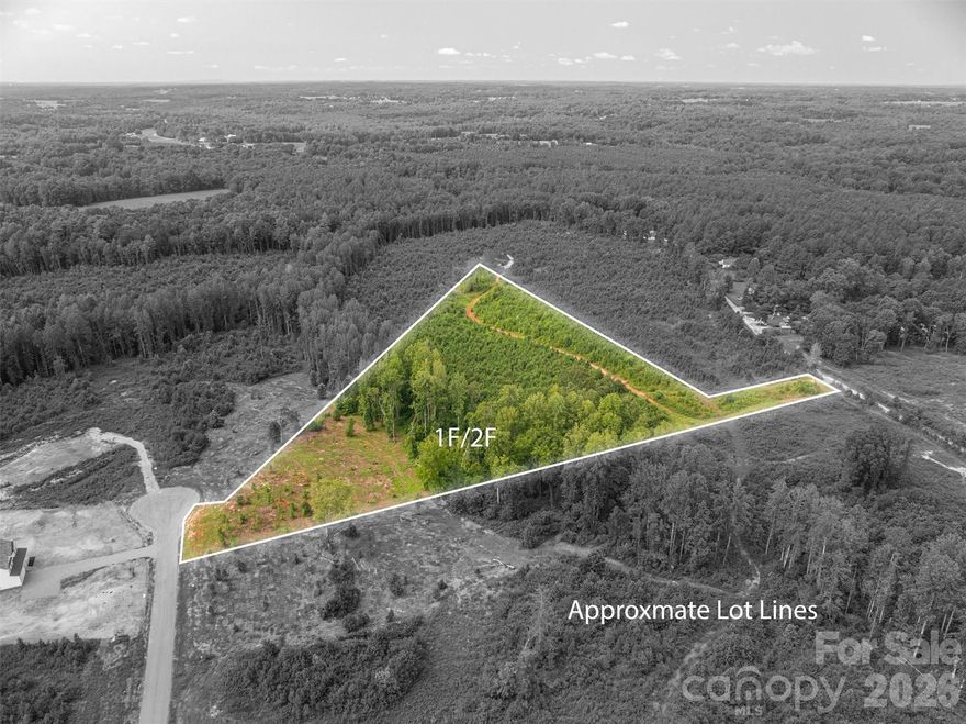 Beautiful acreage about 45 minutes west of Charlotte located in Lincoln County.  A total of 10 acres and two lots are being sold together providing the ideal spot for multi-generational living!  McCurry Farms is a small subdivision with NO HOA and consisting of only approximately 13 homes on oversized lots.  Lot F1 & F2 is unique because it has two possible driveway options: F1 would come off of McCurry Farm Lane but anything built on F2 could come off of McCurry Farm Lane OR Westwinds Road.  This makes the perfect opportunity for you to have a barn on the back side of the property with easy access in and out and then your home on the front side of the property.  F1 is mostly clear of large trees and only bordered at the rear with a wall of tree cover.  F2 has some mature trees but also has thicket that would be easy to clear for a home or left to give the wild life that likes to roam McCurry Farms a nice haven.  Whether you want a private estate, ability to hunt out your back yard or just that small neighborhood vibe, this property is waiting for you.  Everyone is looking for acreage these days so grab this opportunity before its gone too!  Also to note lot F1 has already been perked for a 4 bedroom home.  Minimal CCRs are in place to keep the neighborhood nice.