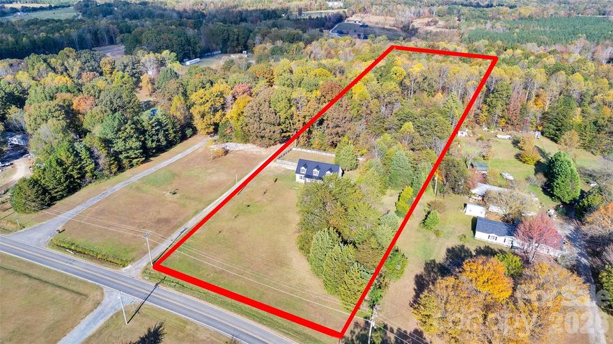 Welcome to this marvelous Cape Cod–style home situated on 10 beautiful acres in the highly sought-after heart of Troutman. Just minutes from I-77, shopping, dining, and Lake Norman State Park and much more.

This property offers endless possibilities. It can be used as a single family residence, multigenerational, 
living with room to expand and build additional homes, or as an opportunity for a builder, looking to create a small track of homes. 

Inside, you’ll find three bedrooms plus two generously sized bonus rooms upstairs, each with its own closet and a shared bathroom. These flexible spaces are perfect for guests, multi-generational living, homeschool rooms, hobbies, or a home office.

Recent updates provide peace of mind and modern comfort, including a fully encapsulated crawlspace, brand-new HVAC system, new carpet throughout, fresh interior paint, updated stair railings, and stylish new lighting and ceiling fans.

The primary suite serves as a private retreat, featuring an oversized soaking tub designed for ultimate relaxation. Thoughtfully designed for both comfort and functionality. Move-in ready and full of character, this Troutman gem invites you to embrace peaceful living with unforgettable sunrises and sunsets.