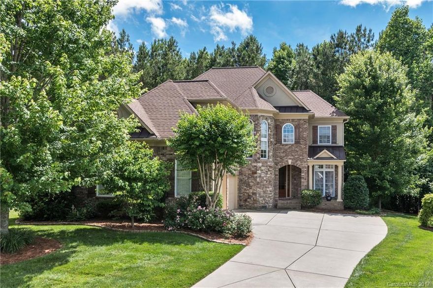 Full brick John Weiland home in resort-like Bridgemill! Entertain w/ this well appointed kitchen, open two story great room w/stone fireplace. The generous master retreat is the perfect getaway. Sit on your 3-season porch and enjoy the privacy of nothing but trees behind you or take advantage of this amenity rich neighborhood, complete w/ 2 pools, tennis, volleyball, and basketball courts, clubhouse, fitness center, pond and walking trails. It is like being on vacation everyday! Welcome Home!