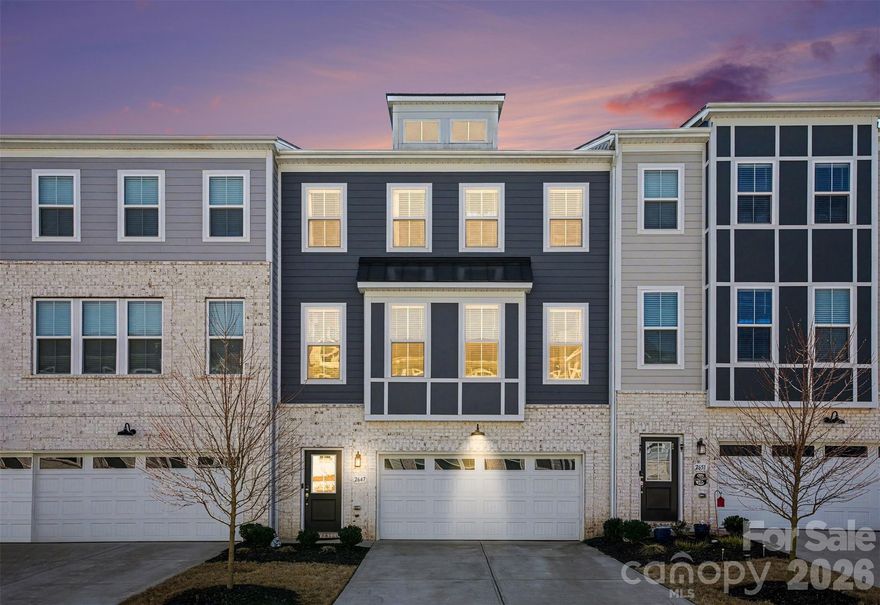 Beautiful newer construction luxury townhome located in Indian Land! This energy-efficient home has the perfect layout, featuring a large bonus area/office/bedroom on the ground floor with a full bathroom and large closet and access to a covered back patio area. The second level is the heart of the home with open floorplan and tons of natural light. The dining area and spacious gourmet kitchen open to a cozy living area with fireplace and access to a large screened patio. There is a convenient office nook and half bath as well. The kitchen is truly a dream with a huge island with gorgeous quartz countertops, a large stainless farmhouse sink, tons of cabinets and a walk-in pantry. The stainless appliance package includes a 36" gas cooktop and a smart microwave and convection wall oven. Retreat to the third level to a large primary bedroom complete with a large walk-in closet and beautiful ensuite bathroom with double quartz vanities and a large tile shower. The additional two bedrooms, full bathroom and laundry room make this floor a private and quiet getaway. Tankless water heater and smart home features add to the efficiency of this home.   This home is $184 a Sq Ft!! Comparable homes are $200+ a Sq Ft!! You really must see this home!!