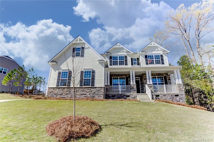 Gorgeous home with all the space you need & a screen porch for outdoor entertaining! Upgraded light & plumbing fixtures, carriage style garage door, crown molding, designer interior paint, iron rail & pickets, tile in master shower & upgraded flooring throughout! Designer Kitchen includes birch cabinets, granite countertops, recessed lighting, hardware, backsplash & stainless appliances! Come see today!