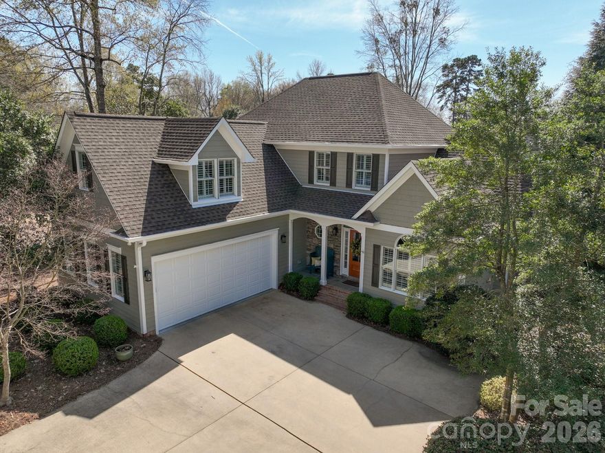 Luxury, lock-and-leave living awaits in one of North Carolina’s premier lake and golf communities. This beautifully maintained Millingport home at Uwharrie Point sits on an oversized lot with mature landscaping, all cared for by the HOA. The inviting floor plan features a spacious owner’s suite and a tastefully updated kitchen equipped with newer high-end appliances, including a double oven. A bright breakfast room flows into the living area, where vaulted ceilings and a dramatic floor-to-ceiling gas fireplace create a striking centerpiece. The adjoining sunroom opens to an elevated porch overlooking a park-like backyard and a world-class practice putting green—perfect for relaxing or dining outdoors. This elegant home offers true peace of mind, with the roof, HVAC, kitchen appliances, and interior paint all updated in 2021–2022, and the exterior freshly painted in 2026. Enjoy a short walk to the Old North State Club’s clubhouse, championship golf course, boat docks, pickleball and tennis courts, pools, and more—all within an easy hours drive of Charlotte, Greensboro, and Winston-Salem.