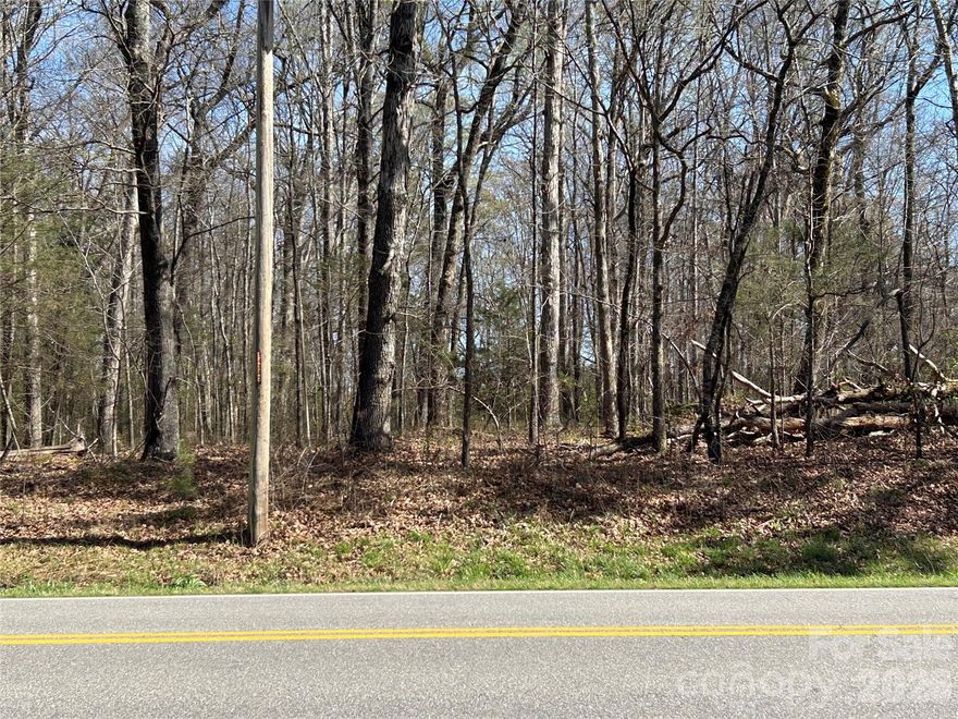 Looking for the perfect spot for your dream home?  Beautiful wooded 3.5 acres  1 1/2 miles from Hwy 24/27 and just outside of the small quaint town of Oakboro.    No HOA's or CCR's and outside city limits.   This is a rare find that offers quiet country living in a desirable area and just minutes from restaurants, grocery store, pharmacy and a beautiful park with a walking trail.