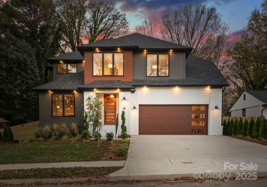 Discover the latest new construction home from the highly popular Northway Homes Signature Series, offering luxury-grade craftsmanship, high-end finishes, and designer lighting, all within minutes of Charlotte’s top schools, dining, shopping, and entertainment. This brand-new, 3300 sq. ft. Madison Park residence features a bright, open-concept main level with 10-foot ceilings and seamless flow between the living, dining, and chef’s kitchen. The kitchen showcases premium stainless steel appliances, a wine refrigerator, quartz countertops with full backsplash, custom cabinetry, a walk-in pantry, and a large island centerpiece with seating for 3–4. The large main living area opens to a covered rear deck and a private backyard, perfect for year-round entertaining. The main-level primary suite offers a spa-like bath with dual vanities, a standalone tub, a glass-enclosed shower, a private water closet, and a custom walk-in closet. An office and an oversized two-car garage complete the first floor. Upstairs, 9-foot ceilings frame a thoughtful layout featuring three bedrooms, a spacious bonus room ideal as a fourth bedroom or office, a Jack-and-Jill bath, an additional full bath, a laundry room with custom shelving, and an unfinished storage area. Additional highlights include engineered hardwoods throughout, porcelain tile in baths, a tankless water heater, and top-tier insulation and weatherproofing systems. Ideally located in Madison Park, this home is minutes from Park Road Shopping Center, Montford, SouthPark, South End, major highways, and a short drive to Uptown and CLT Airport. Don’t miss your chance to tour this exceptional new construction home!