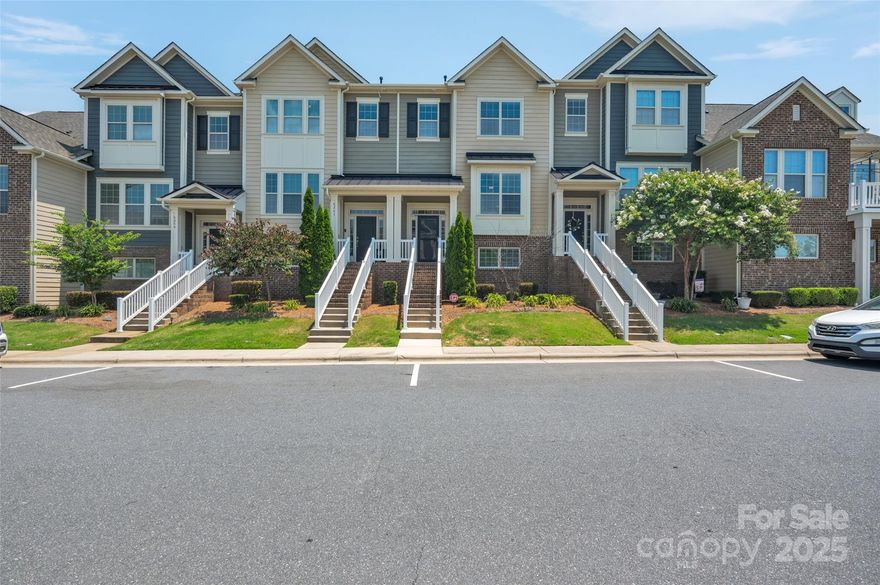 Tega Cay 3 Bedroom plus office/bonus room Townhouse in Cameron Creek. Open Floorplan. Main floor has living room, large kitchen with granite counters, white cabinets, stainless appliances, gas range, island plus counter bar seating,  walk in pantry, dining area & laundry room. Includes washer/dryer & refrigerator. Lower level has large flex room/office/bonus room, & storage closet. Two car garage plus street parking. Upper floor has 3 bedrooms, primary bath with walk in shower & dual sink vanity. Deck off the kitchen. Cameron Creek amenities: Pool, playground.  Tega Cay is a lakefront community/city on the shores of Lake Wylie. Tega Cay Golf Club, tennis, pickleball, recreational programs, parks & more. Just a short distance to Kingsley and Baxter Village, as well as other convenient shopping/restaurants and I-77. Fort Mill Schools. Gold Hill Middle is the assigned school but is on an enrollment freeze. Please verify with FMSD for the current assignment.