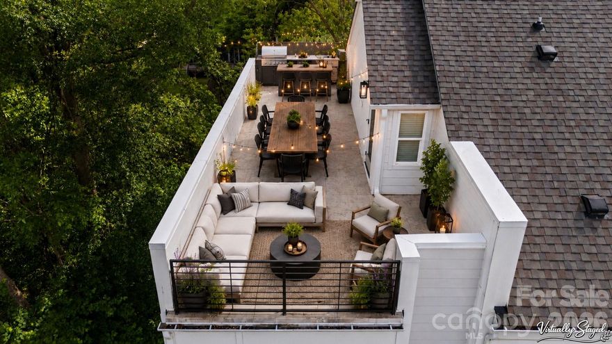 RARE and UNIQUE end-unit townhome in LOSO Terraces featuring a full-width rooftop terrace spanning the entire top level—an exceptional outdoor living space not found in most homes in the community. Designed for entertaining, the rooftop is the perfect setting for sunset cocktails, outdoor dining, or relaxing under the open sky, all enhanced by a private setting tucked into a quiet, wooded corner with tree-lined views on two sides and positioned away from main roads and through traffic.
Ideally located in the heart of Lower South End (LoSo), this home offers true walkable urban living just steps from Olde Mecklenburg Brewery, Protagonist, Sugar Creek Brewing, Queen Park Social, Hive Fitness, Rally Pickleball, and more—plus approximately a 10-minute walk to the light rail station—while still enjoying a peaceful setting removed from road noise.
Inside, enjoy designer finishes including wide-plank hardwood floors throughout, white shaker-style cabinetry, upgraded quartz countertops, stainless steel appliances, and distinctive lighting. The light-filled end-unit positioning provides windows on three sides, creating abundant natural light and added privacy, along with a 2-car tandem garage with electric vehicle outlet.
Featuring 2 bedrooms and 2.5 baths, this is one of only a handful of this floorplan in the community and offers a rare opportunity to own a highly desirable layout that lives larger than its footprint—blending modern design, private, peaceful views, and a vibrant Lower South End lifestyle. Investors welcome—no rental restrictions.