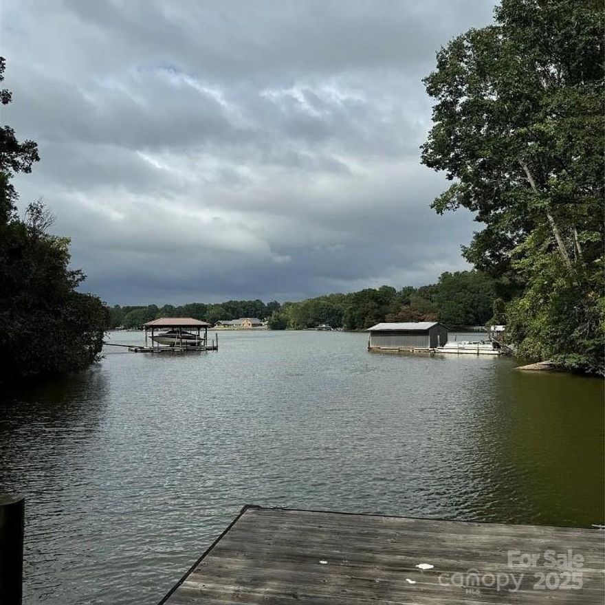 Beautiful Private Waterfront lot in Sherrills Ford Nc, Large .98 Acre lot with big water views. Easement road to lot already in place and easy to drive. Lot has a septic system and well in place. Both well and septic will need to be inspected due to not being used in many years. Mobile Home has no value. Value is in the land. Newly built dock in place & deeded with Duke.
Seller said Water at the dock was 15-18 ft Deep