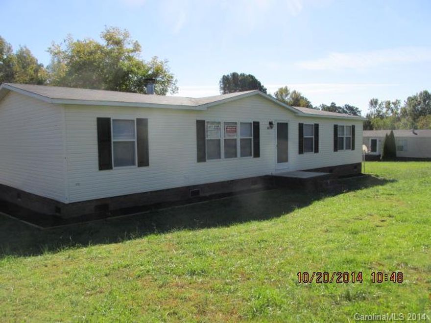 Interior make over. Seller has put in new carpet, paint, fixtures ready to move in. Large spacious kitchen and breakfast area. Separate dining room and Great room with fireplace. Over 1 acre lot with huge rear deck and yard. Convenient proximity to town of Albemarle.