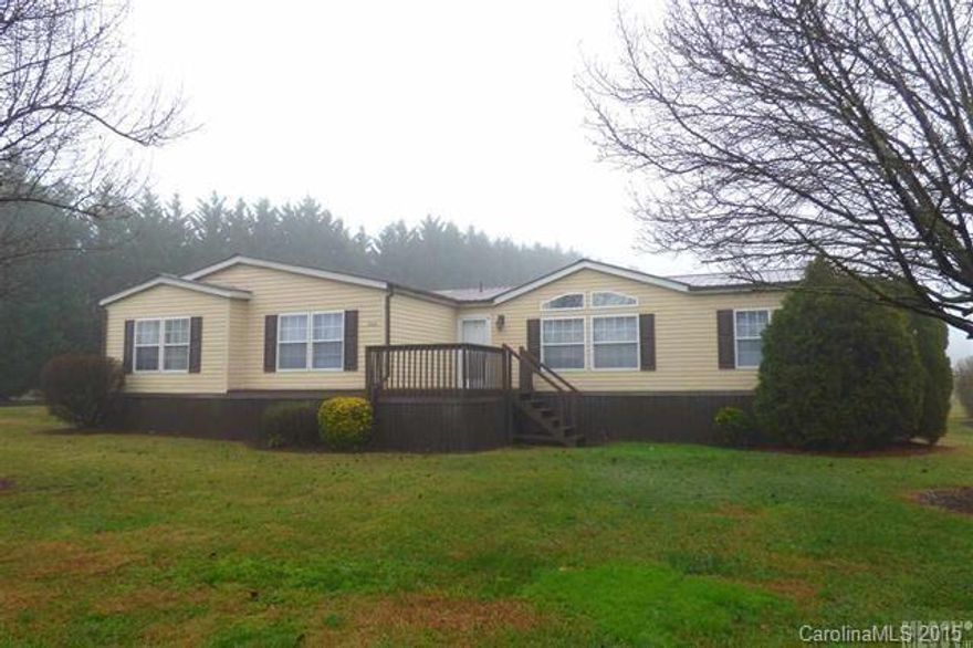 WOW! Over 2200 heated square feet AND 2.7 acres!! This value-priced home offers tons of space and is clean as a whistle! Features include a vaulted ceiling living room, formal dining room, den with stacked stone fireplace, large kitchen with center island, all appliances, and an adjoining breakfast room. You'll also find three spacious bedrooms, including a master suite with walk-in closet, en-suite study or private office, and a huge master bath with corner tub and double vanity.