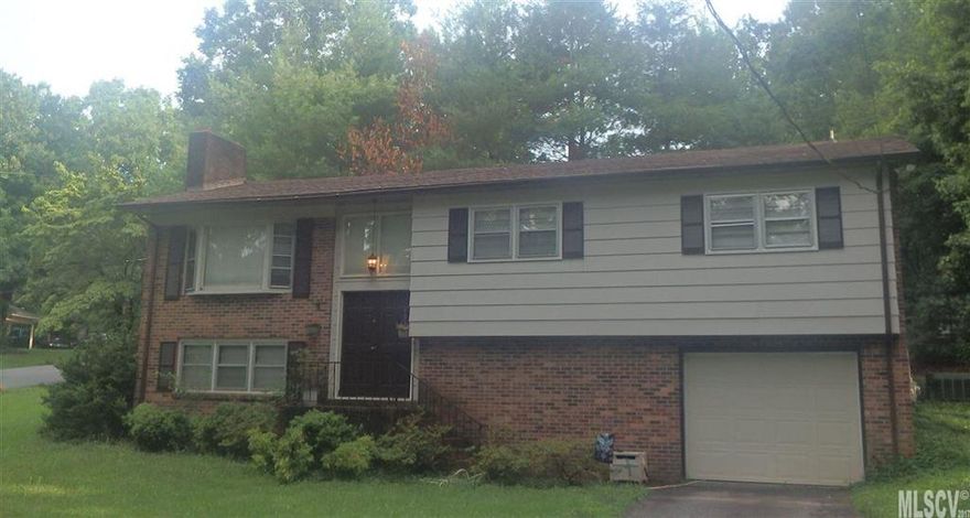 Lots of house for the money!  Home has been updated with wood floors in the main living areas and wrought iron railing on the foyer steps. Living room features brick fireplace and bayed window. MBR has 1/2 bath. Secondary bedrooms are spacious. Another brick fireplace is located in the Finished Den in Basement which also has a full bath. Single garage and lots of storage space. Desirable school districts.