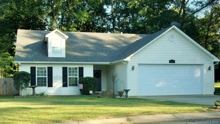 Very cute, well maintained home in a quiet, family friendly subdivision that is minutes from I-77. The home boasts laminate wood floor throughout, a 2 car garage, beautiful fenced in yard, custom bathroom sink and many other features. This home is a steal and will not last long. Must See!