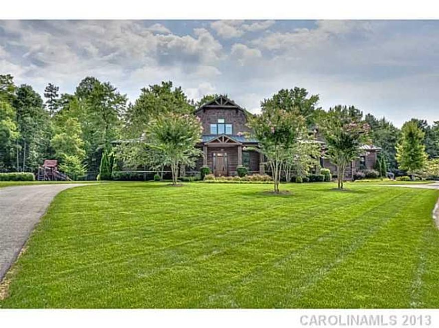 Amazing 35 acre gated estate in Mooresville, built in 2007 and  over 6,000 sq ft with a pool and great outdoor living area. The master suite is located on the main level. Other amenities include a 4 car garage, generator, enclosed summer kitchen, Hickory Trim/ Cabinets, indoor basketball court, Icynene insulation, instant hot water system. CLICK THE VIRTUAL TOUR FOR OVER 50 MORE PHOTOS!!!