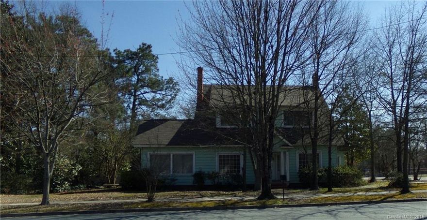 Don't miss this attractive two story older house, located on corner lot, in the heart of downtown Pageland.  This spacious house has a lot of potential! Make "this old house" a home with your renovation/update ideas.  It features a large living room, sitting room, den with fireplace, kitchen, dining room, master bedroom and full bathroom on the first floor.  The second floor features three bedrooms, one full bathroom and sitting area.  The rear yard is fenced.