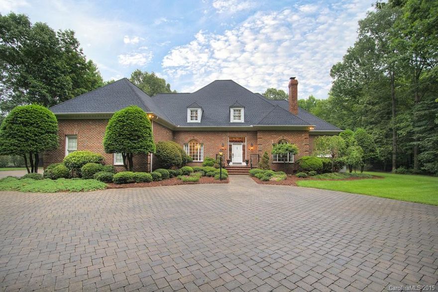 Over 13 sub-dividable acres! Amazing equestrian facilities + barn/feed rm/tack rm/7 stalls/heaters/full bath. Pool house w/Kitchenette and full bath. Gunite pool w/hot tub. Outdoor Kitchen with fireplace and living area. Covered patio with slate floor. Custom throughout. All Bedrooms w/direct access to Baths. Huge walk-in attic storage. Central vac. Ipod system in house and pool house. Full house water softener. 5-6 acre pasture. Arena lights. Covered horse trailer parking. See Virtual Tour!