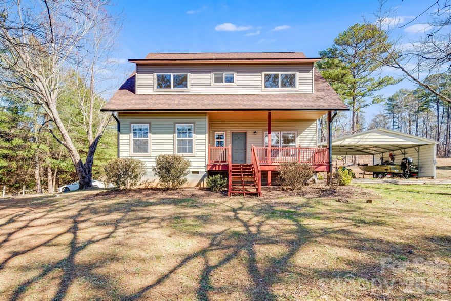 Welcome to 188 California Branch in Union Mills, where comfort, space, and picturesque country views come together on just over 7 beautiful acres.

This inviting home features a bright, open-concept layout with large windows that flood the main living areas with natural light and showcase the peaceful surrounding landscape. The primary suite is conveniently located on the main level, offering privacy and ease of living.

Upstairs, you’ll find two spacious bedrooms connected by a Jack-and-Jill bath, plus an amazing rec room that provides endless possibilities -media room, playroom,  or game space!

Recent updates include new LVP flooring throughout the main level and fresh paint throughout the whole home.

Step outside and enjoy over 7 acres to explore, garden, play, or simply relax and take in the serene country setting. A carport and multiple outbuildings provide excellent storage and workspace options for hobbies, equipment, or recreational needs.

If you’ve been looking for space, flexibility, and beautiful rural views, this is the one.