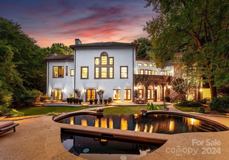 Welcome to 5403 Gorham Drive, a masterpiece of elegance and craftsmanship. This exquisite home features a timeless Hard Coat Stucco and Stone exterior, complemented by a Lifetime Tile Roof and elegant copper accents. The lushly landscaped grounds offer a private retreat with a vanishing edge pool, custom pergola, built-in gas grill station, & extensive outdoor lighting. Inside, the 8” Walnut Plank Floors & custom brickwork create a sophisticated ambiance, while the Great Room’s 20’ ceilings add grandeur. The chef's kitchen is a culinary delight with Wolf appliances, Sub-Zero refrigeration, and Calcutta Marble countertops. The upper level showcases suites with reclaimed wood beam ceilings and luxurious ensuite baths. The lower level impresses with a home gym, a 1,200-bottle wine cellar, a second office with a gas fireplace, and a lavish guest suite. With its unparalleled blend of elegance and functionality, this residence stands as a true testament to refined luxury living.