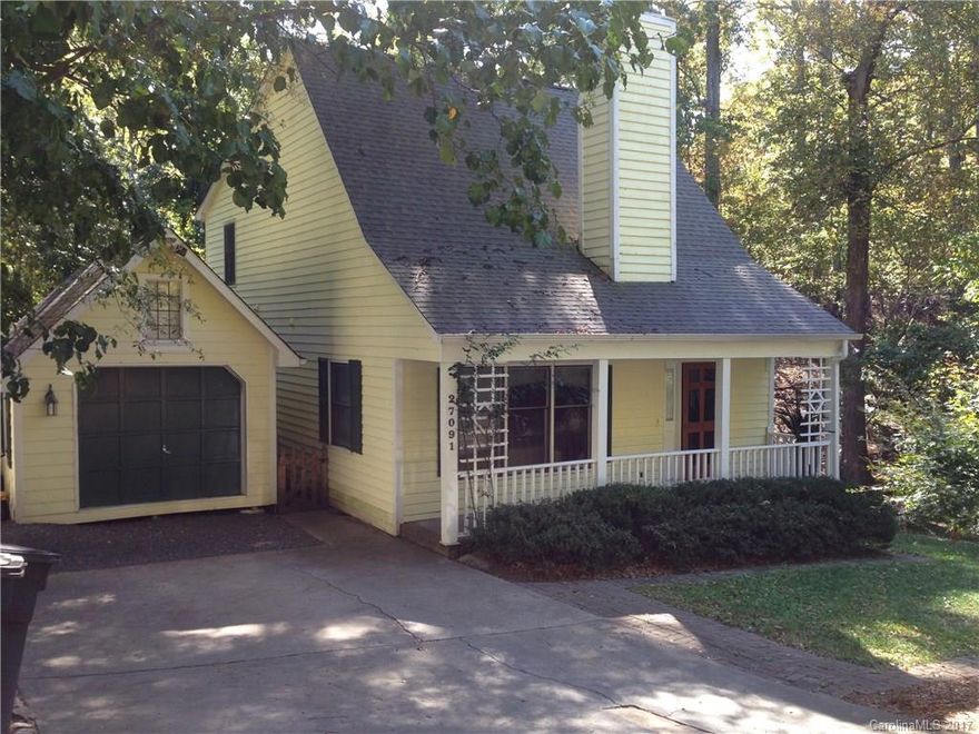Located in popular golf community in the heart of Tega Cay with lots of character, nestled in a private wooded lot near the marina. Within walking distance of the home you'll enjoy walking paths, playgrounds, ball fields and summer concerts along with organized city functions throughout the year. Seller is offering an allowance for new paint & flooring up to $10k.