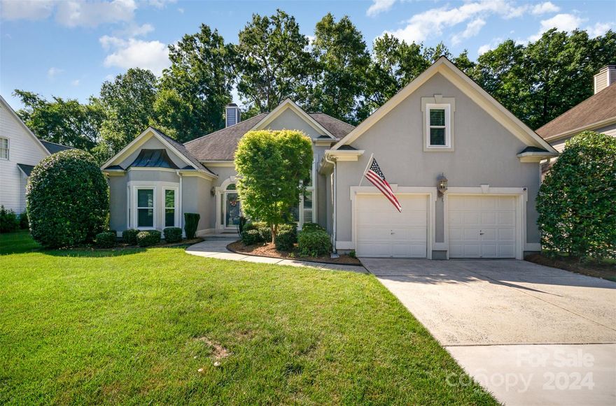 Don't miss this opportunity to be in Blakeney!  Sellers had to relocate to be near family.  This home has numerous upgrades including crawl space encapsulation, new furnace (2021); tankless water heater, new windows and redesigned kitchen with new appliances (2023). Modern technology enhancements include a CPI security system, wirelessly controlled lights, garage door, market lights, smart thermostats and fire/CO2 detectors. The interior boasts tall ceilings and hardwoods throughout, beautiful archways and open concept floor plan. Large primary ensuite includes separate walk-in closets, frameless shower and soaking tub. Enjoy the sunroom featuring eze-breeze windows overlooking the fenced, tree-lined backyard with large deck area. The bonus room over garage leads to a walk-out attic space with second level and utility stub-ups for expansion. Situated in the quiet Hunter's Gate neighborhood, you'll benefit from top-rated schools, along with a variety of dining and shopping options.