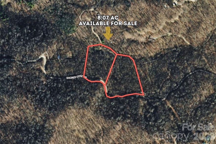 8 Acres. A Creek. 30 Miles From Asheville — Two lots being sold — as one Western North Carolina at Its Finest. Few properties anywhere in Western North Carolina can say all of this at once — and this one does effortlessly. Nestled along Sacred Cove Drive in Clyde, Haywood County, North Carolina, this breathtaking 8.07-acre parcel rises between 3,400 and 3,600 feet of dramatic elevation, with a scenic dry creek bed winding through the very heart of the property and the kind of rare, wild, and deeply soul-stirring mountain beauty that only the most exceptional parcels in this celebrated region can ever offer. No flood zone, no floodway, and electricity confirmed through Haywood EMC — every essential element in place and nothing standing between you and the mountain life you have always imagined. R-1 zoning permits single-family site-built homes, giving you a clean, protected canvas to build exactly what you have always envisioned. Whether you are creating a breathtaking custom mountain home, designing the ultimate private retreat far above the noise of everyday life, or securing a rare and powerfully appreciating piece of Western North Carolina land near one of America's most beloved cities — this property rises to meet every vision with beauty, freedom, and lasting worth. Just 30 miles from vibrant Asheville and 40 miles from charming Brevard, with outstanding dining, shopping, healthcare, and the legendary Blue Ridge Parkway all within easy reach. Mountain land this wild, this beautiful, and this close to Asheville does not wait — your Western North Carolina legacy begins right here.