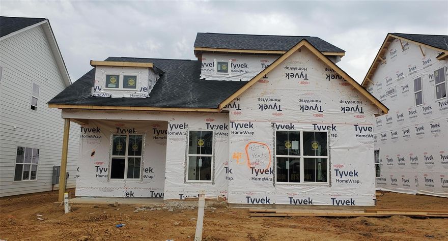 Tennyson is 10 miles outside of Uptown Charlotte and 3 miles to downtown Matthews. Tennyson offers an electic Farmhouse style with sophisticated luxury! Hardie Board siding, Main floor 10' ceilings, 8' doors, front and back porches, luxury vinyl plank flooring in main living areas, tile in wet areas, quartz countertops, gourmet kitchen w/island, cook top with chimney hood vent, butler pantry, white farmhouse sink, SS appliances, tile backsplash, grey cabinets, silver hardware, designer lighting, spa shower, ceiling fans, crown molding, wood window casing, professional landscaped yards, tons of upgrades. Playground, Dog Park, Walking trails. Home Site 45 Dickinson "C" Light Mist (Not color shown)  Floor plan/ Urban. Home is scheduled for Early 2023 Delivery. VERY MOTIVATED SELLER >>>Need Homes SOLD ASAP>>> MAKE AN OFFER!!!